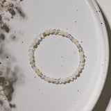 Rosenquaz Bergkristall und Orangen Calcit Armband