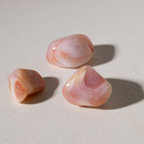 Aprikosenachat Trommelstein