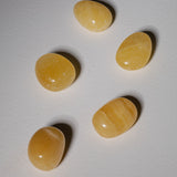 Orangen Calcit Trommelstein