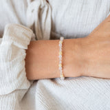 Rosenquaz Bergkristall und Orangen Calcit Armband